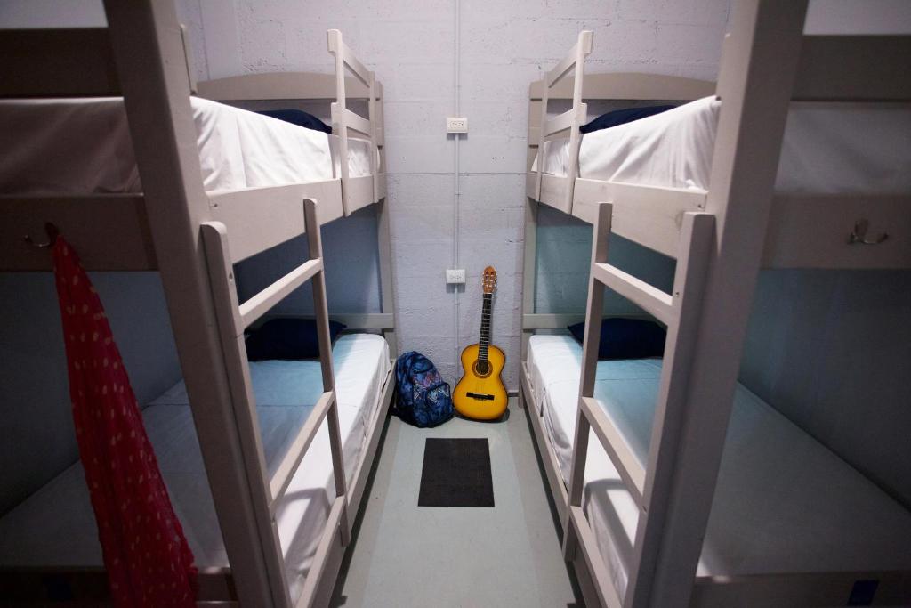 Postel nebo postele na pokoji v ubytování Hostel Auikyani