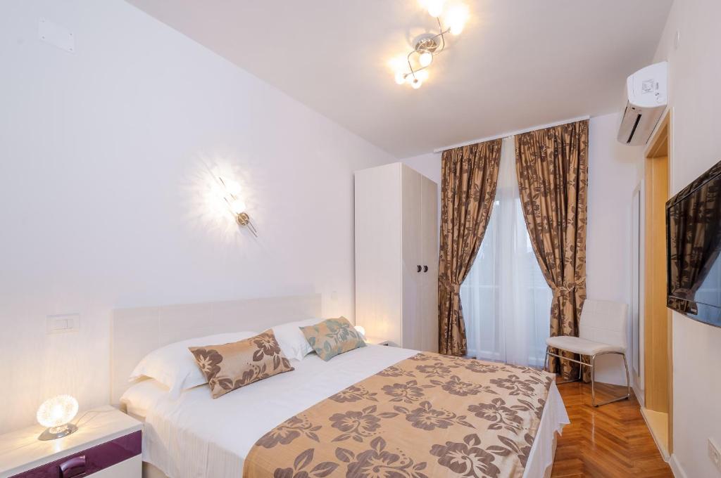 Apartments Žuvela - 带阳台和海景的双人间 - 一楼