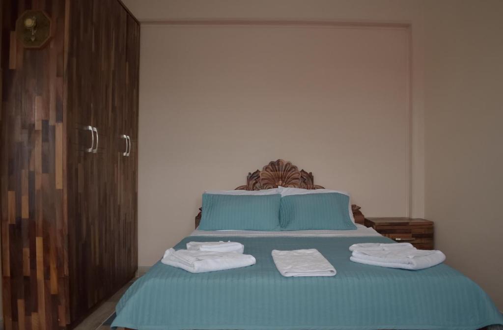 Postel nebo postele na pokoji v ubytování Hotel "VIR"