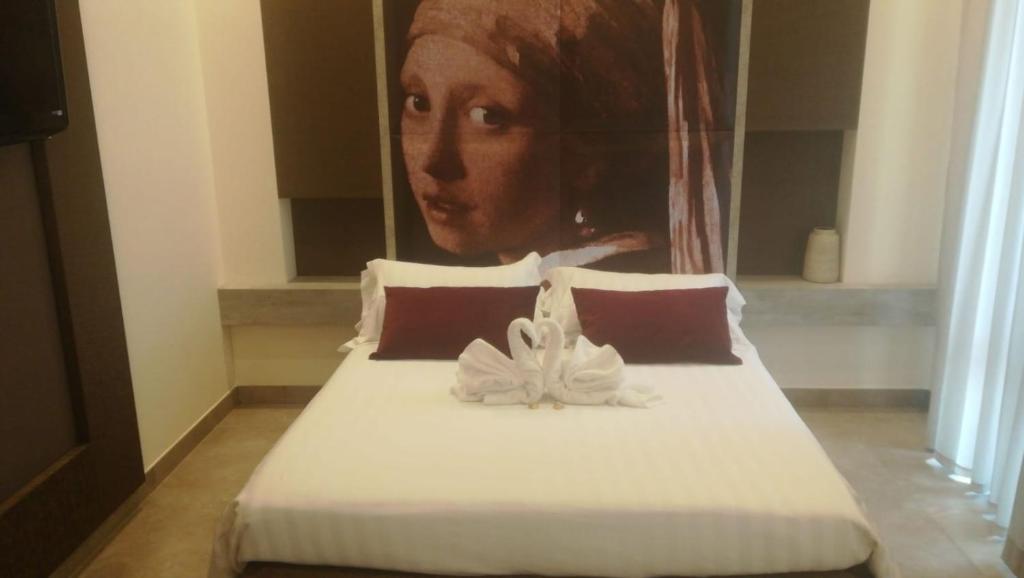 Postel nebo postele na pokoji v ubytování B&B Suite Paciotti