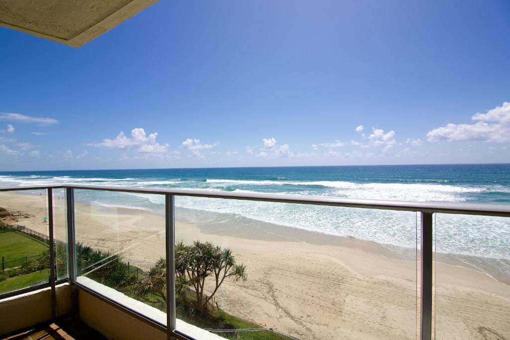 a balcony with a view of the beach at Foreshore Beachfront Apartments in Gold Coast