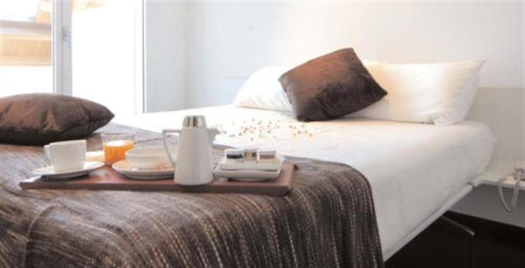 Postel nebo postele na pokoji v ubytování 15.92 Hotel