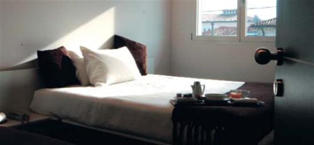 Postel nebo postele na pokoji v ubytování 15.92 Hotel
