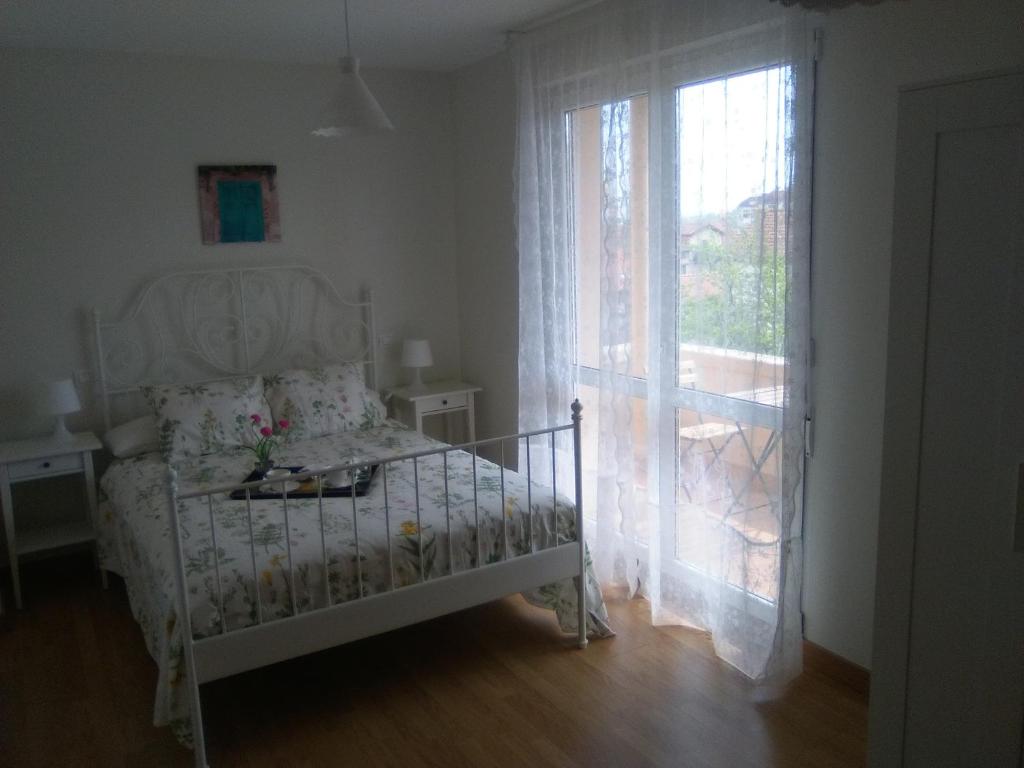Postel nebo postele na pokoji v ubytování El Chalet Rosso