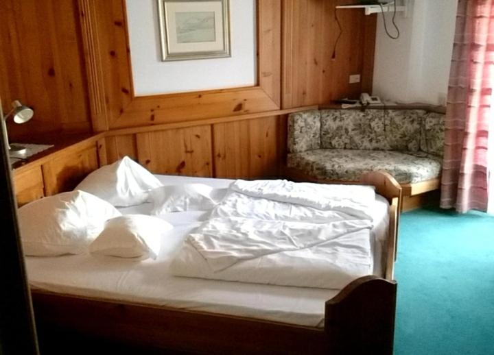 A bed or beds in a room at Villa Rier