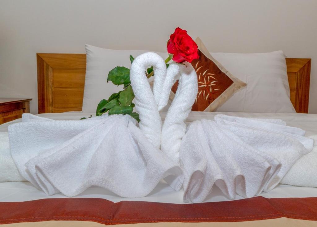 Postel nebo postele na pokoji v ubytování Legend Connect Homestay