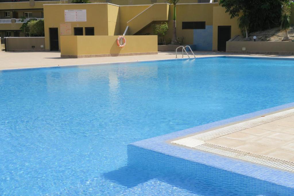 Bazén v ubytování MEDANO4YOU Pearl Flavour Holiday Home nebo v jeho okolí