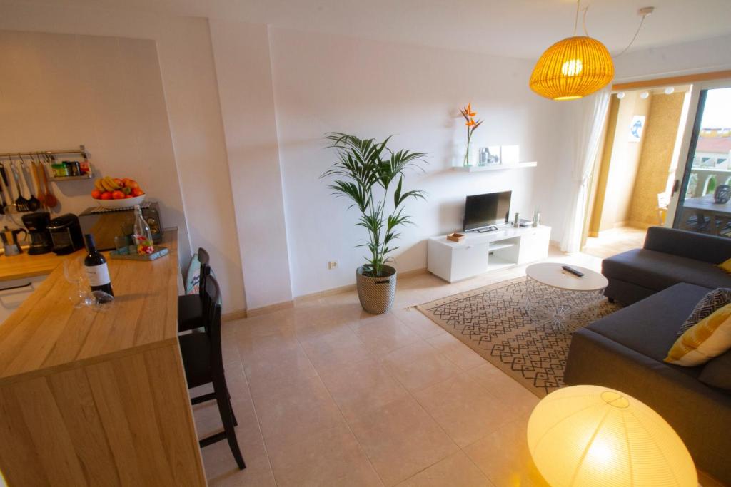 Posezení v ubytování MEDANO4YOU Pearl Flavour Holiday Home