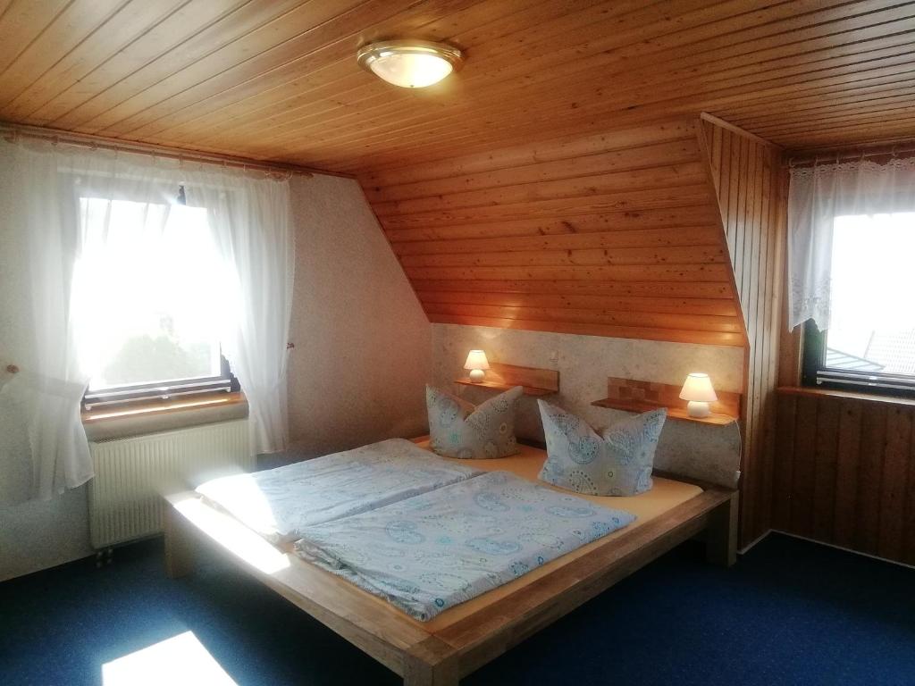 Postel nebo postele na pokoji v ubytování Apartments Achterblick