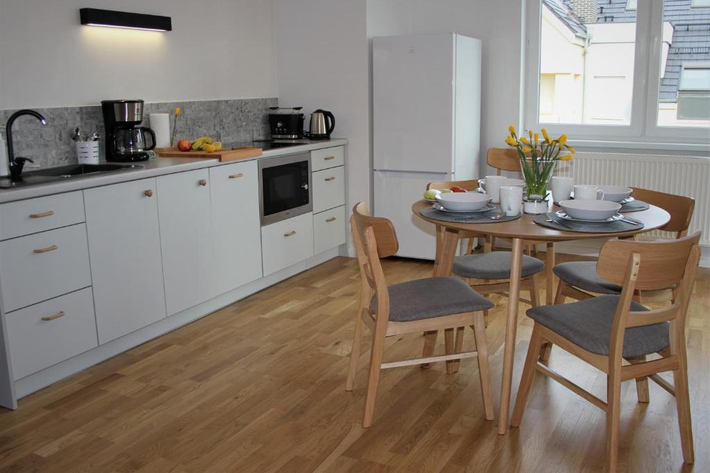 Kuchyňa alebo kuchynka v ubytovaní Apartament Zielone Tarasy