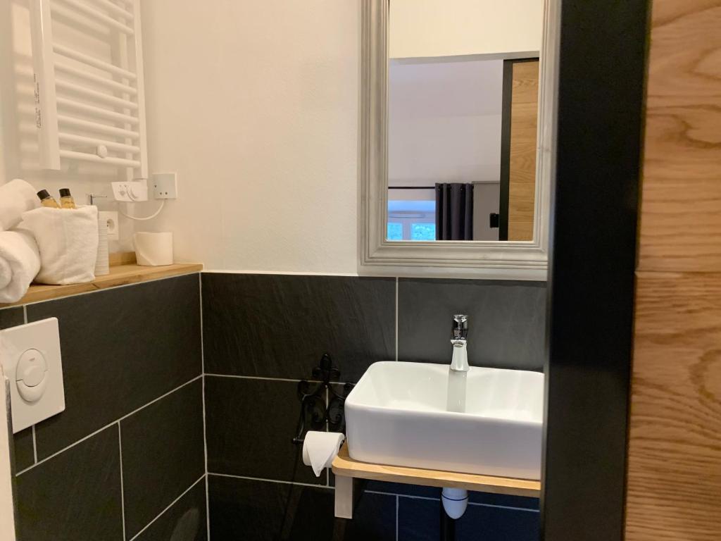 Koupelna v ubytování Hotel Savel