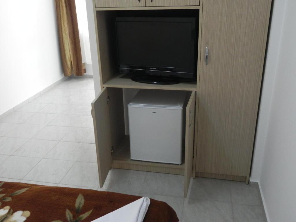 TV a/nebo společenská místnost v ubytování Vila Aproape de Mare by Iubesc Marea