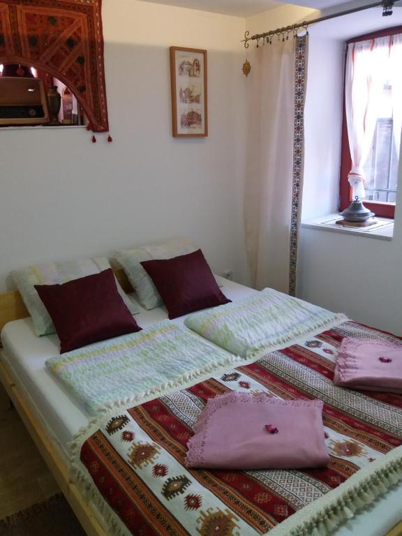 Postel nebo postele na pokoji v ubytování Apartments Vratnik