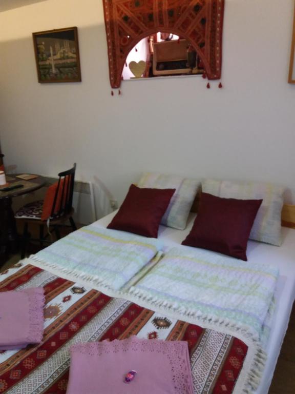 Postel nebo postele na pokoji v ubytování Apartments Vratnik
