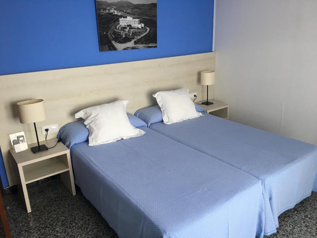 Postel nebo postele na pokoji v ubytování Hotel Gri-Mar