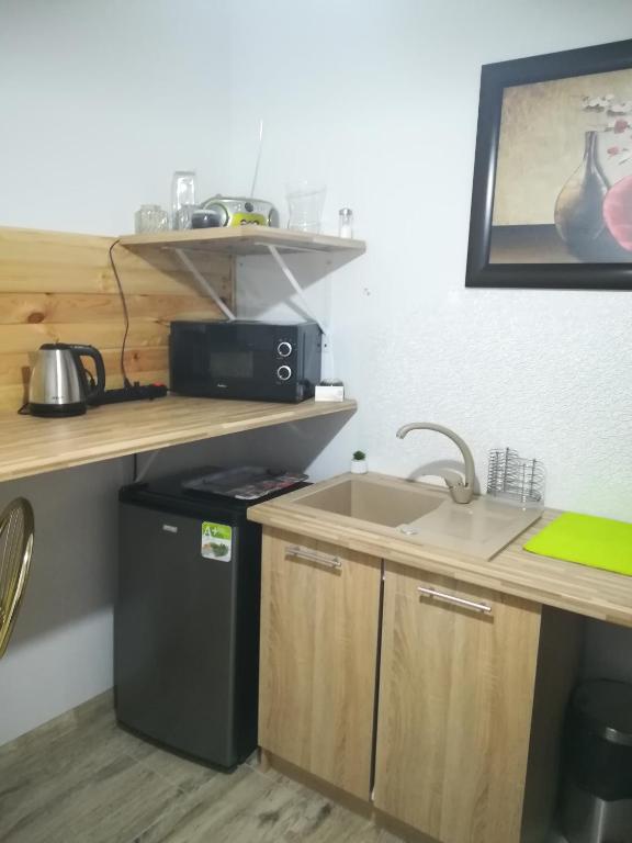 Kuchyňa alebo kuchynka v ubytovaní Apartament wSPAniały.