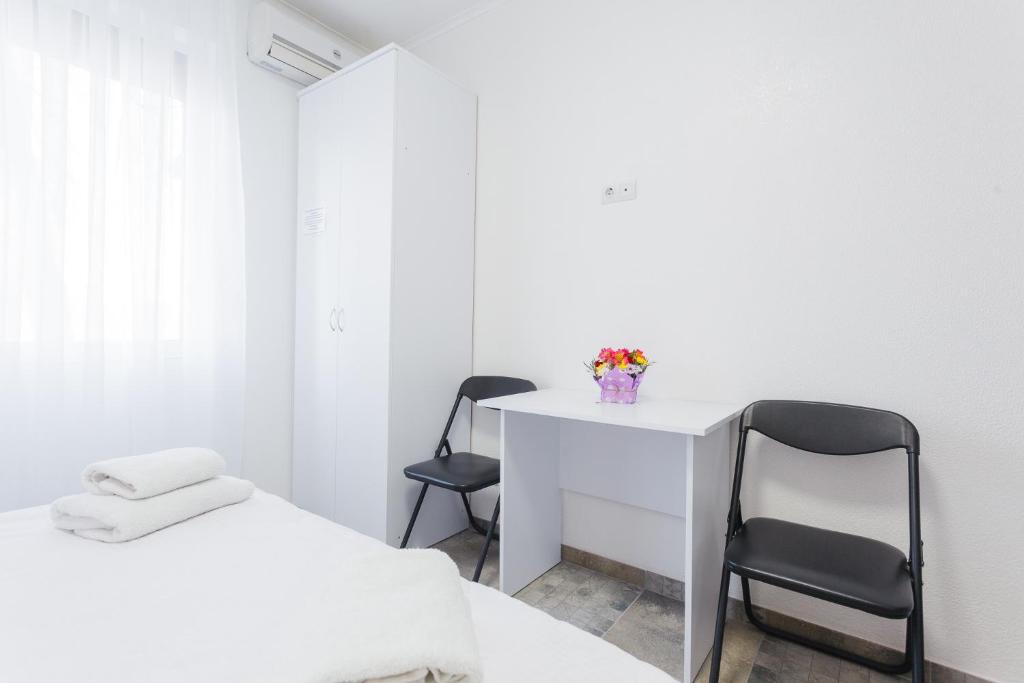 Postel nebo postele na pokoji v ubytování SkyHome na Nauky