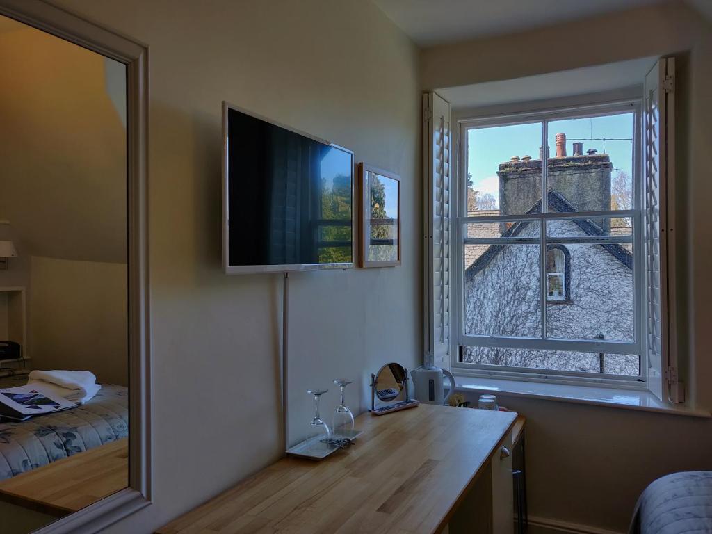 TV a/nebo společenská místnost v ubytování Dene House Guest House