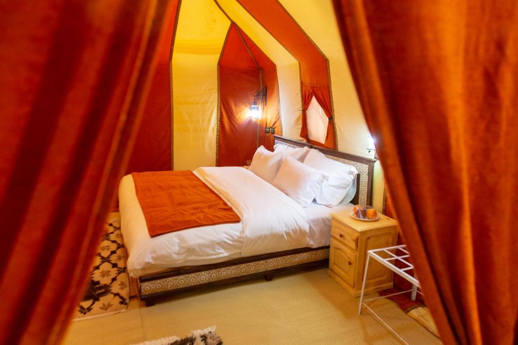 Postel nebo postele na pokoji v ubytování Milky Way Desert Camp