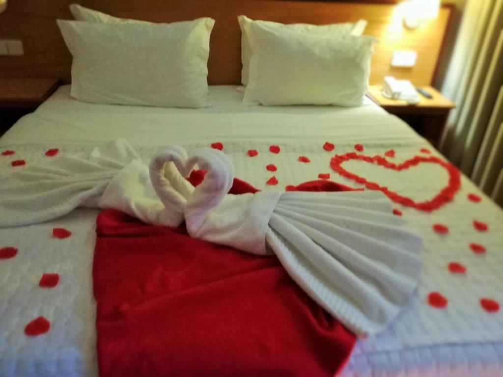 Postel nebo postele na pokoji v ubytování Hotel Dom Vilas