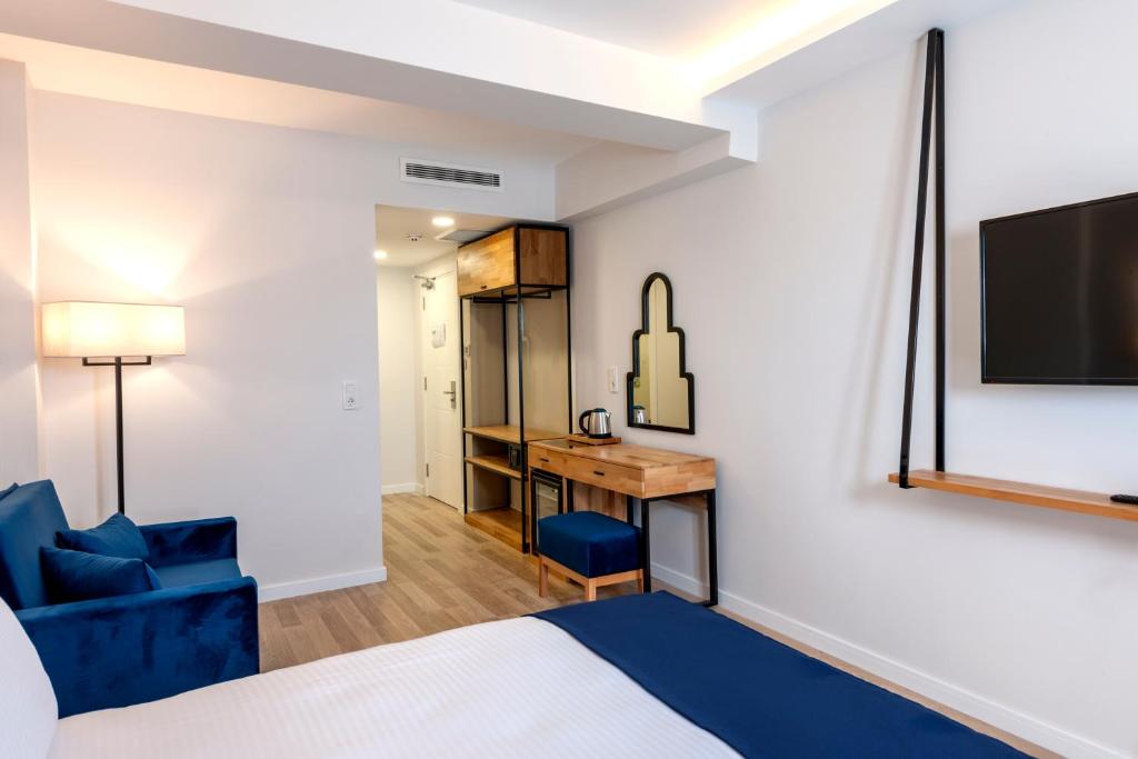 Postel nebo postele na pokoji v ubytování DORUK PALAS HOTEL