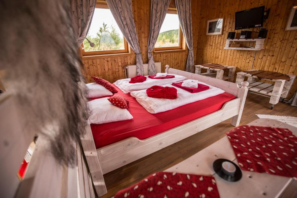 Postel nebo postele na pokoji v ubytování Hestasport Cottages