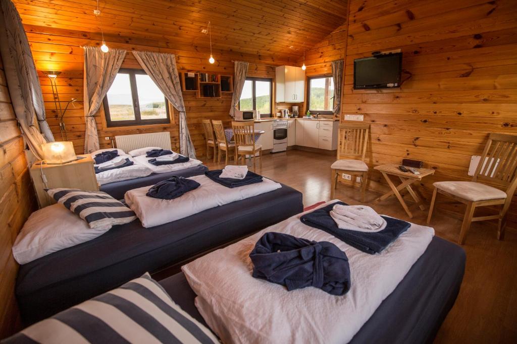 Postel nebo postele na pokoji v ubytování Hestasport Cottages