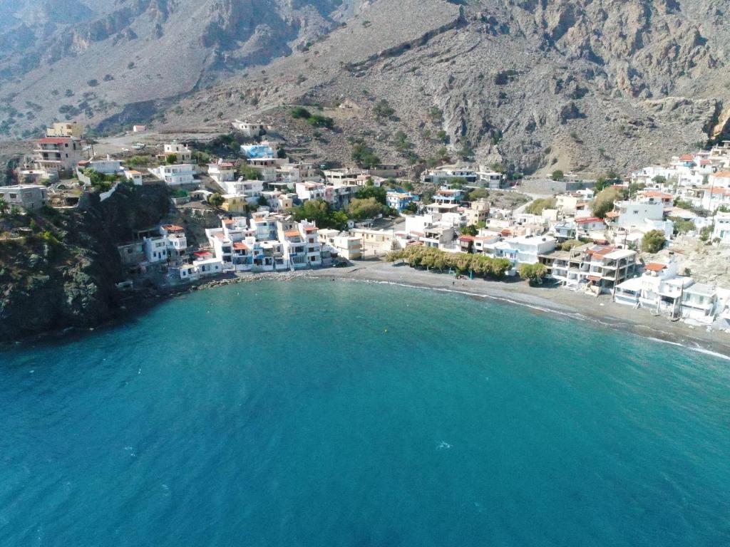 an aerial view of a beach with white houses at House With View in Paránimfoi