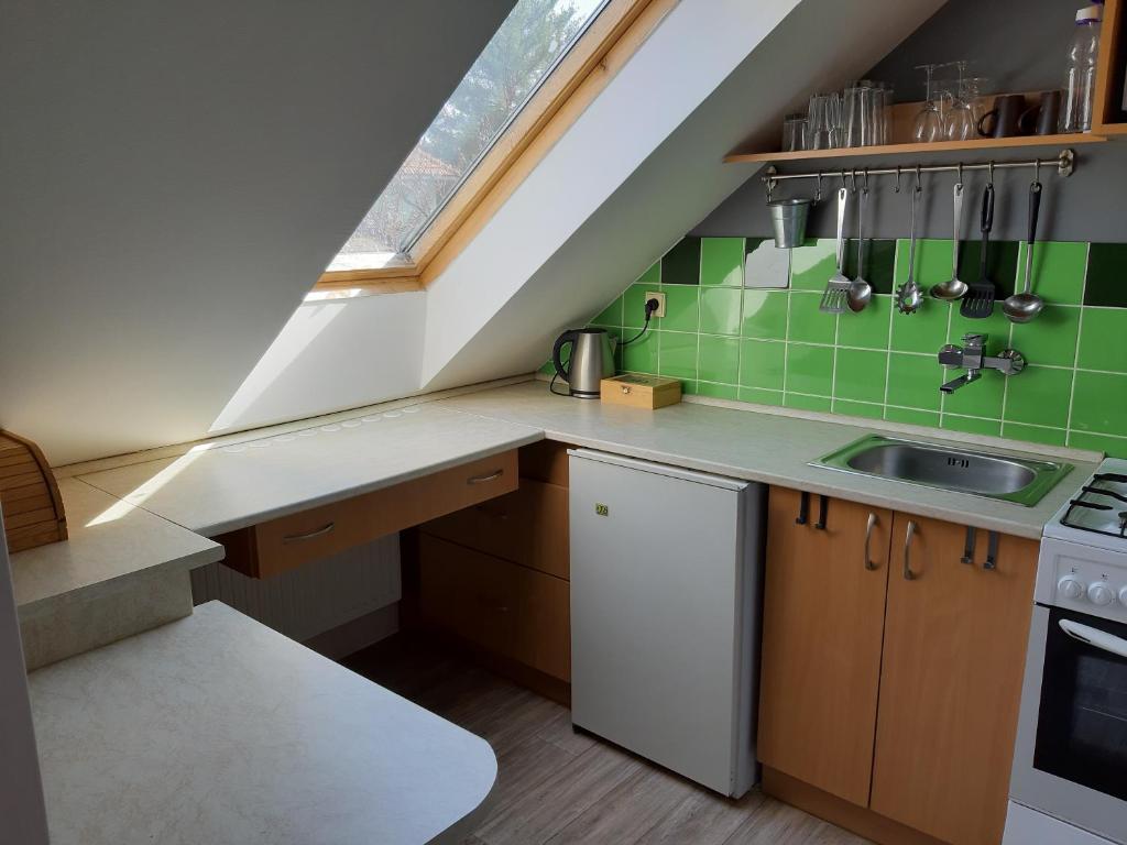 Cucina o angolo cottura di Útulný apartmán