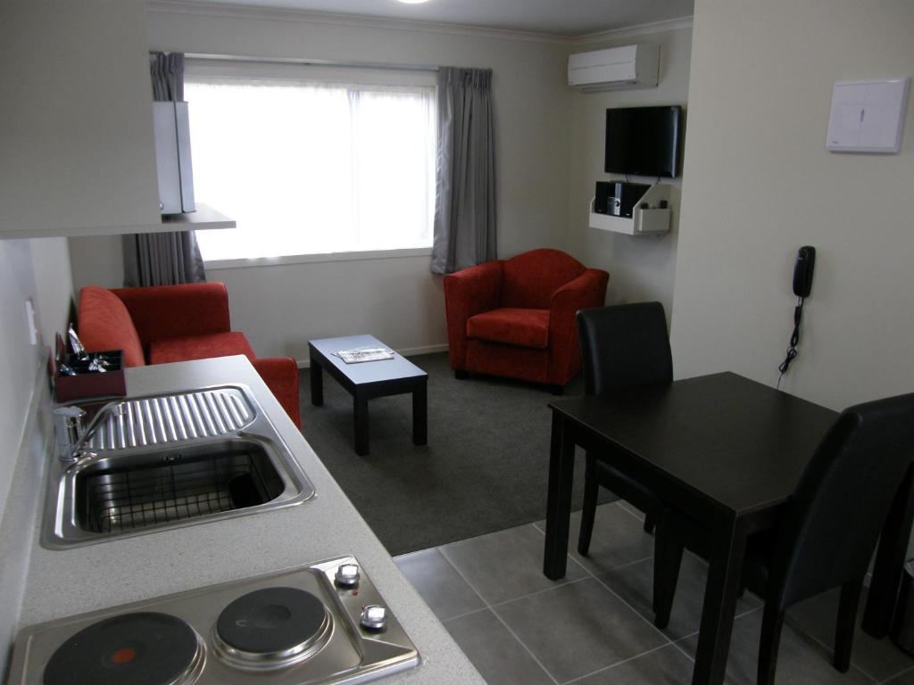 TV a/nebo společenská místnost v ubytování Brooklyn Motor Lodge