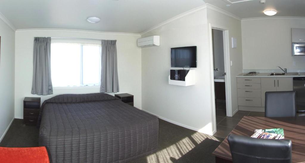 TV a/nebo společenská místnost v ubytování Brooklyn Motor Lodge