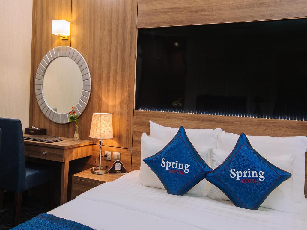 Voodi või voodid majutusasutuse Spring Hotel Hanoi toas
