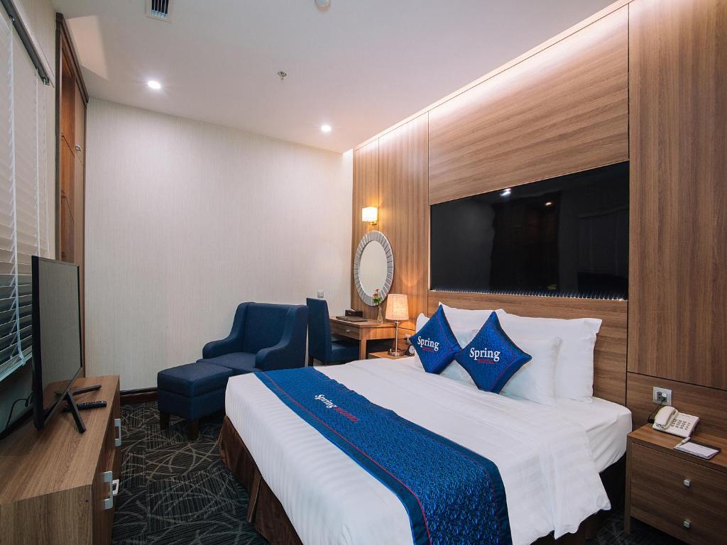 Voodi või voodid majutusasutuse Spring Hotel Hanoi toas