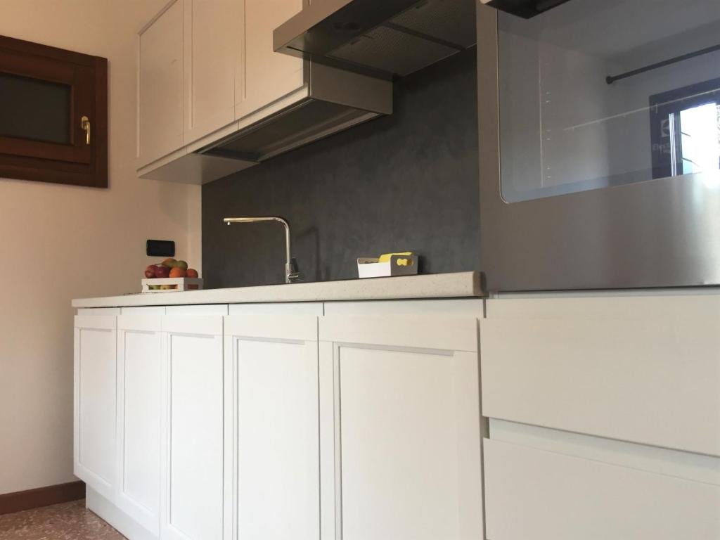 Kuchyň nebo kuchyňský kout v ubytování Hotel Riviera dei Dogi