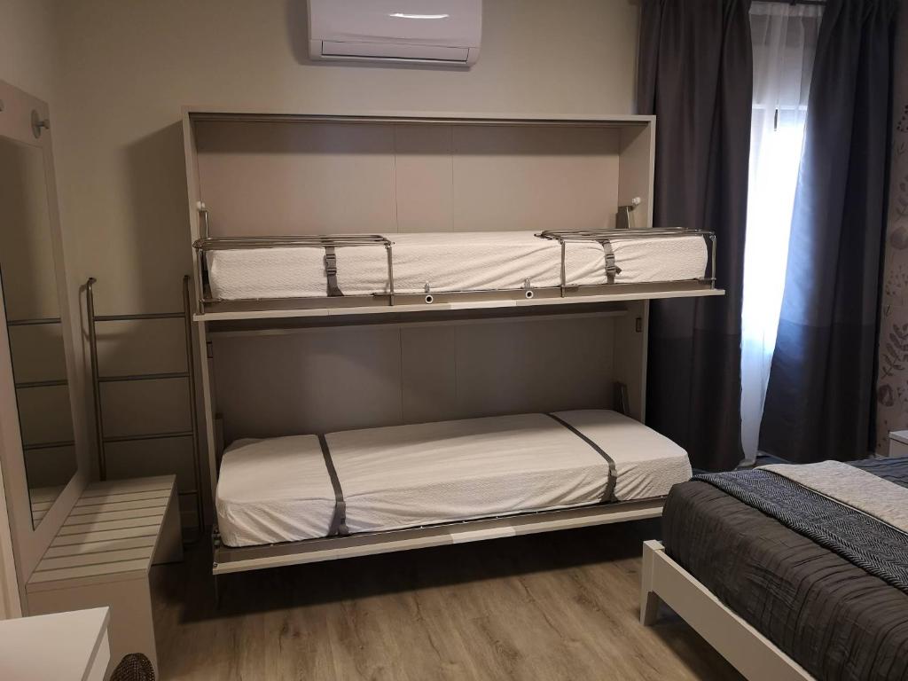 Postel nebo postele na pokoji v ubytování Tra I Castelli