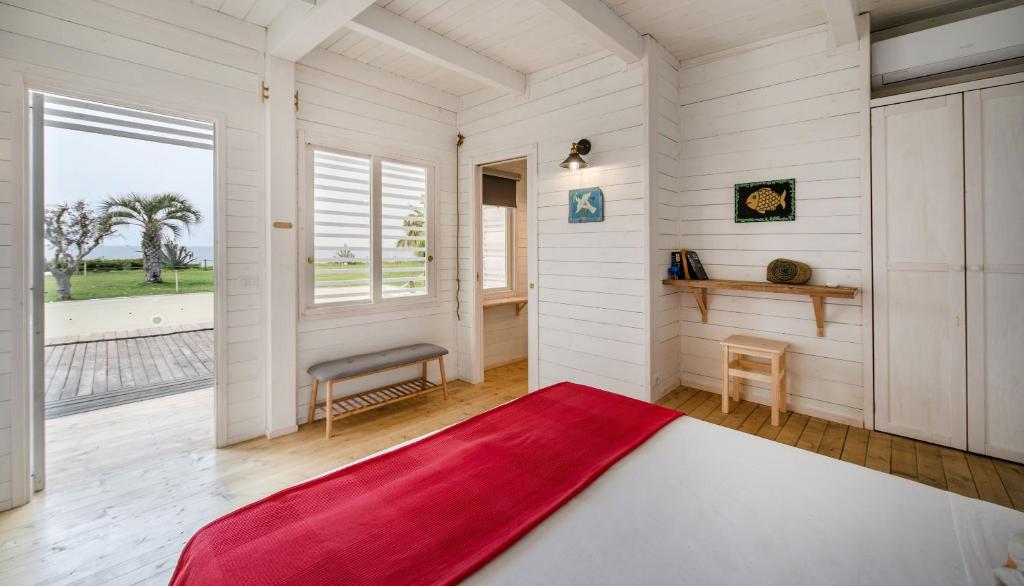 Postel nebo postele na pokoji v ubytování Maresia Rooms