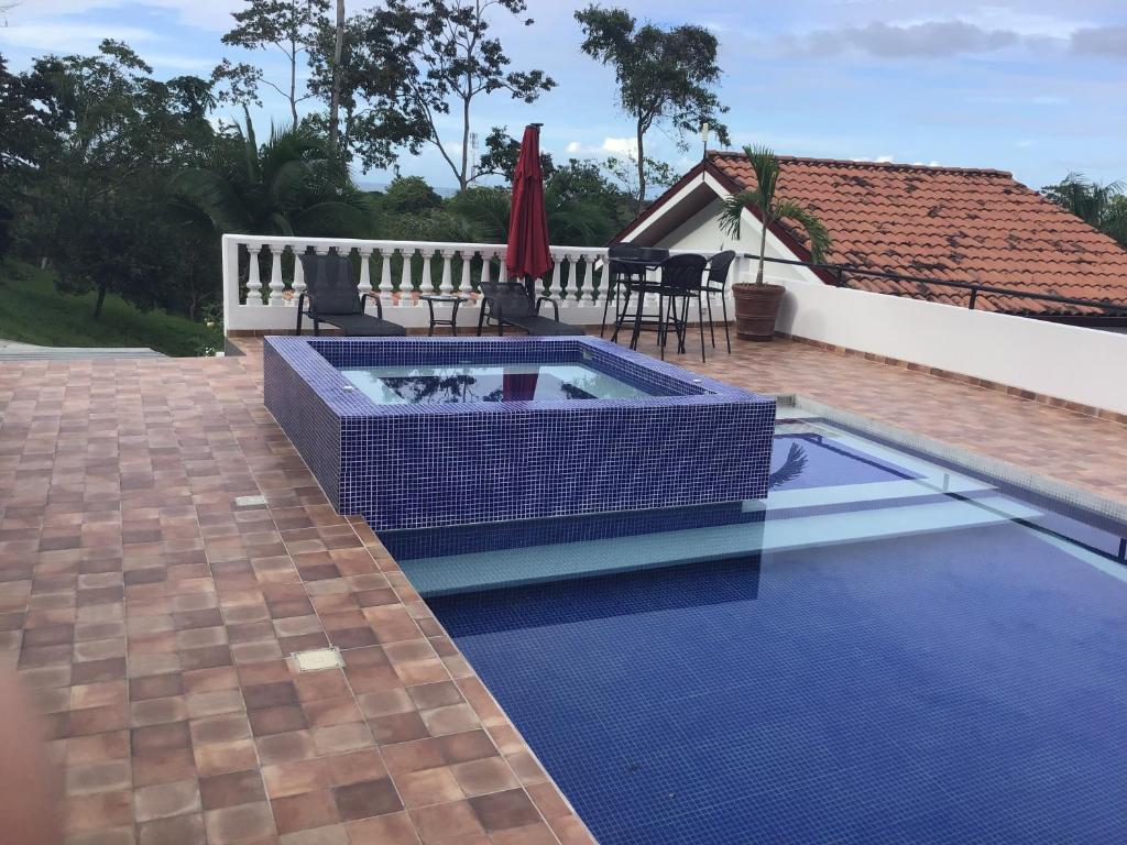 Bazén v ubytování Hotel Los Cielos Del Caribe nebo v jeho okolí