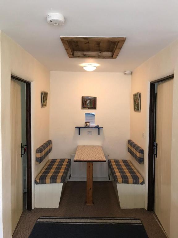 Postel nebo postele na pokoji v ubytování Cleggan Farm Holiday Cottages