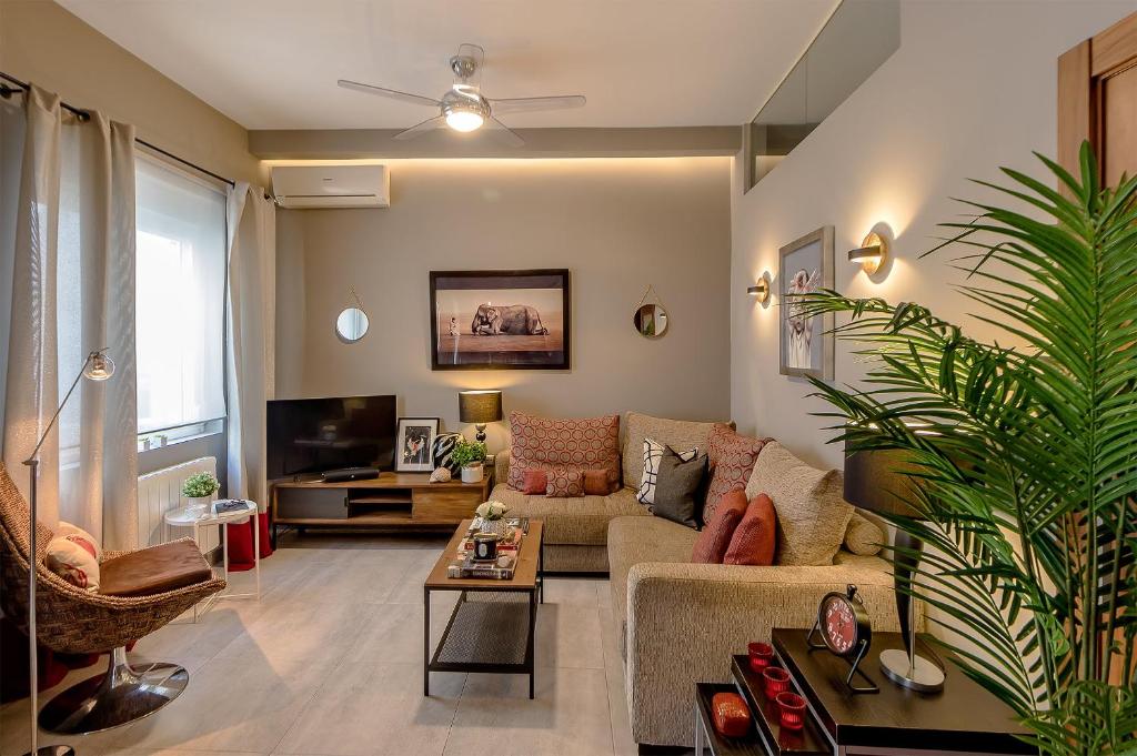 Televízia a/alebo spoločenská miestnosť v ubytovaní Soho Urban Flat - 5 min a Calle Larios, 10 min a playa, en el corazón de Málaga