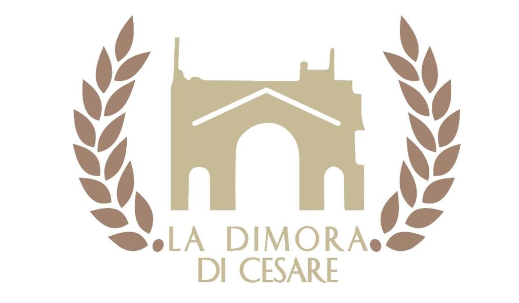 ein Logo eines Schlosses mit Lorbeerkranz in der Unterkunft La Dimora di Cesare in Fano