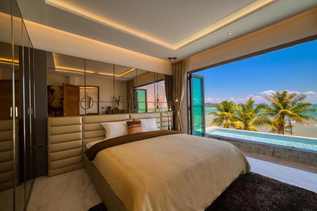 Postel nebo postele na pokoji v ubytování Saengsuree Villas Koh Yao Yai