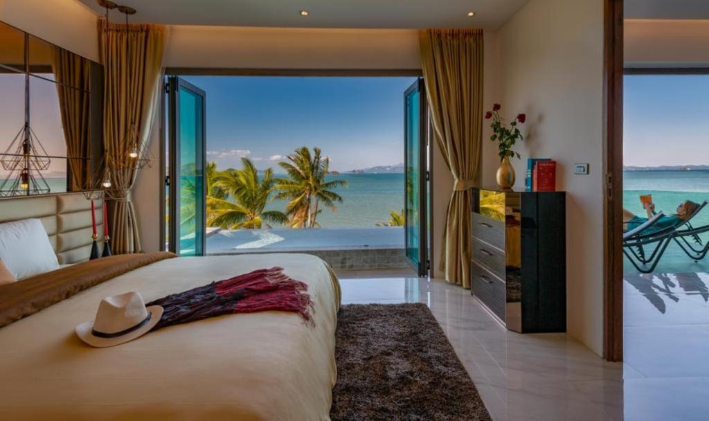 Postel nebo postele na pokoji v ubytování Saengsuree Villas Koh Yao Yai
