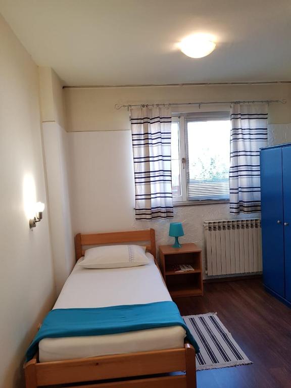 Postel nebo postele na pokoji v ubytování Favela Hostel