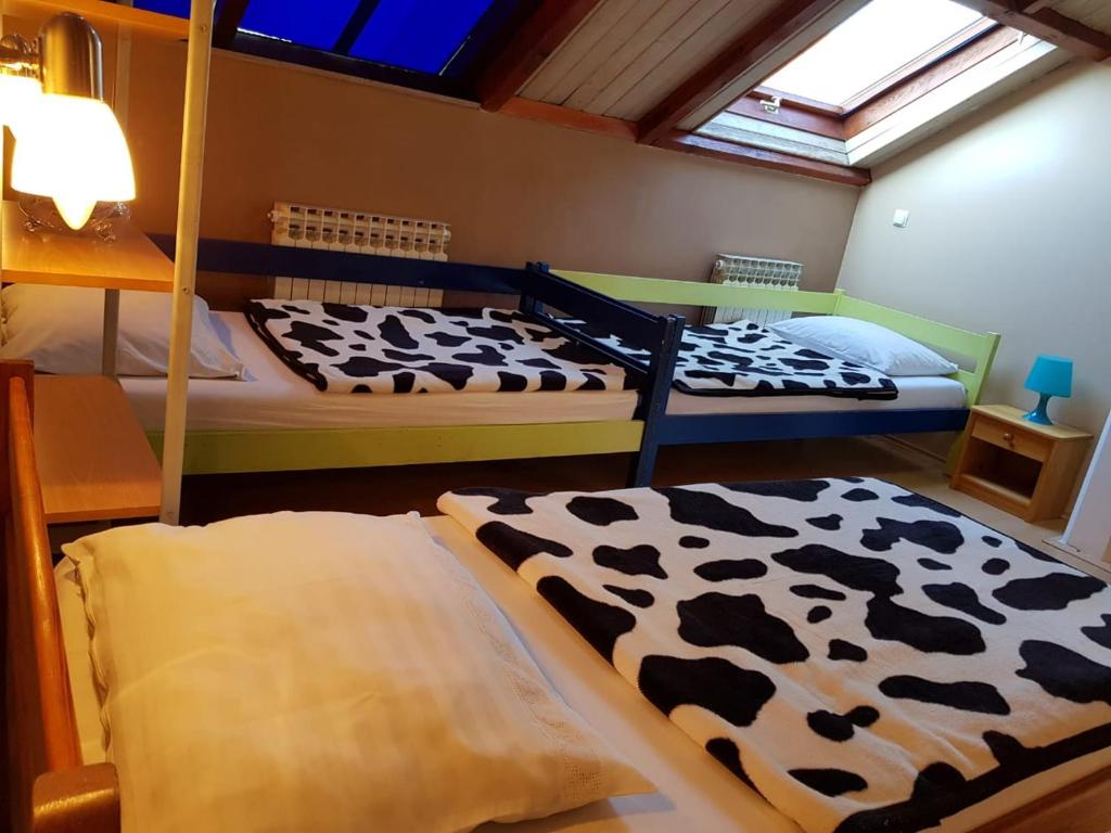 Postel nebo postele na pokoji v ubytování Favela Hostel