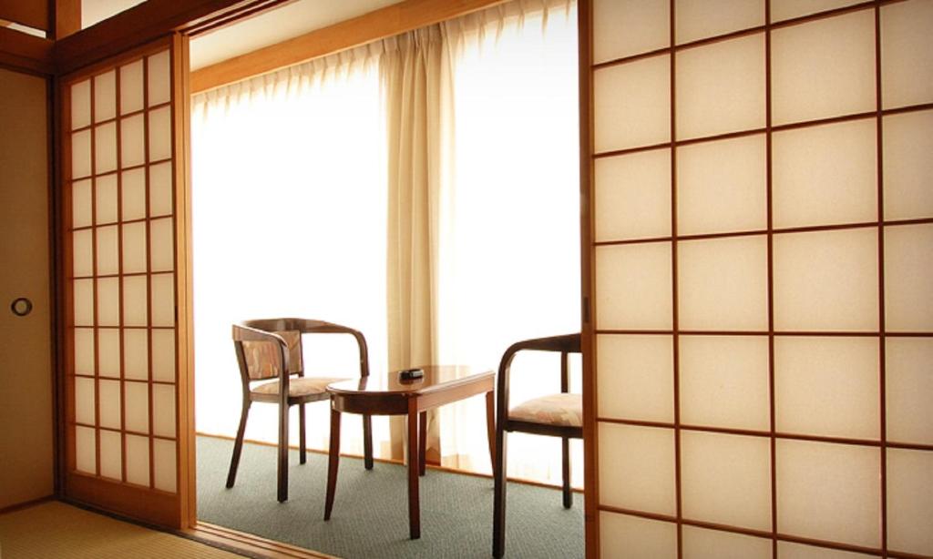 Posezení v ubytování Zekkeino Yado Inubohsaki Hotel