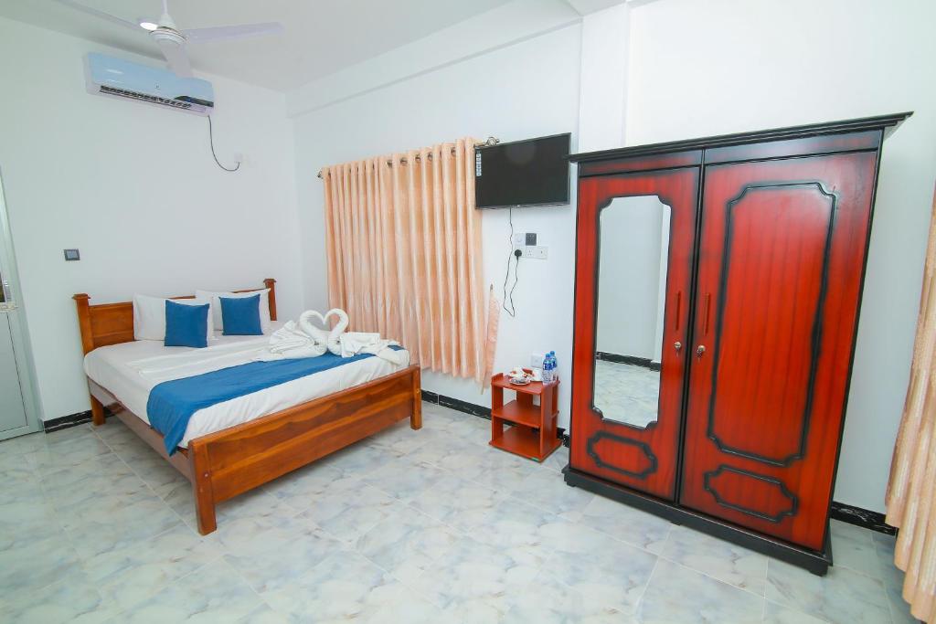 Postel nebo postele na pokoji v ubytování Hotel Sun Blue