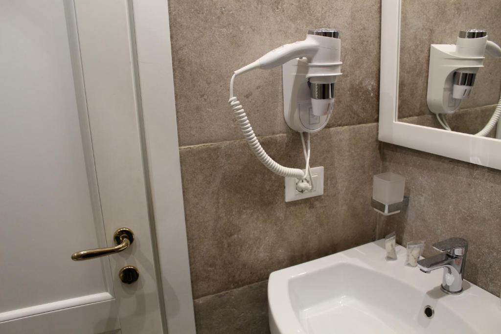 Koupelna v ubytování Rina Rooms