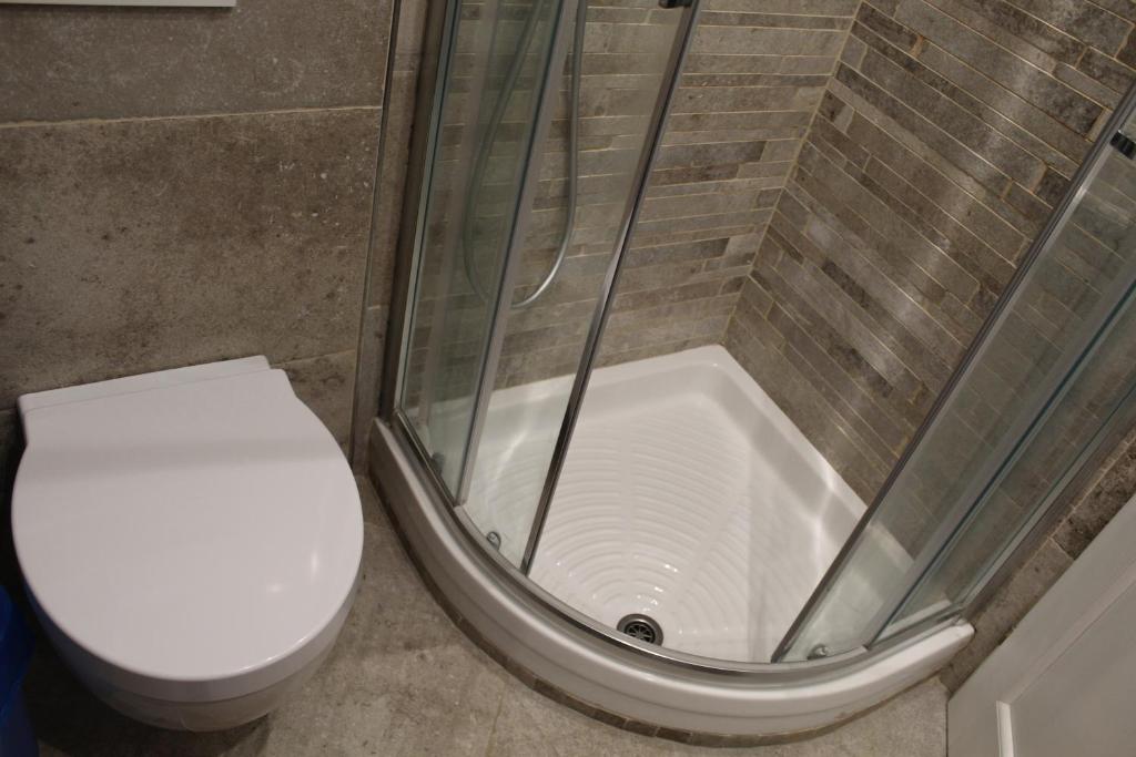 Koupelna v ubytování Rina Rooms