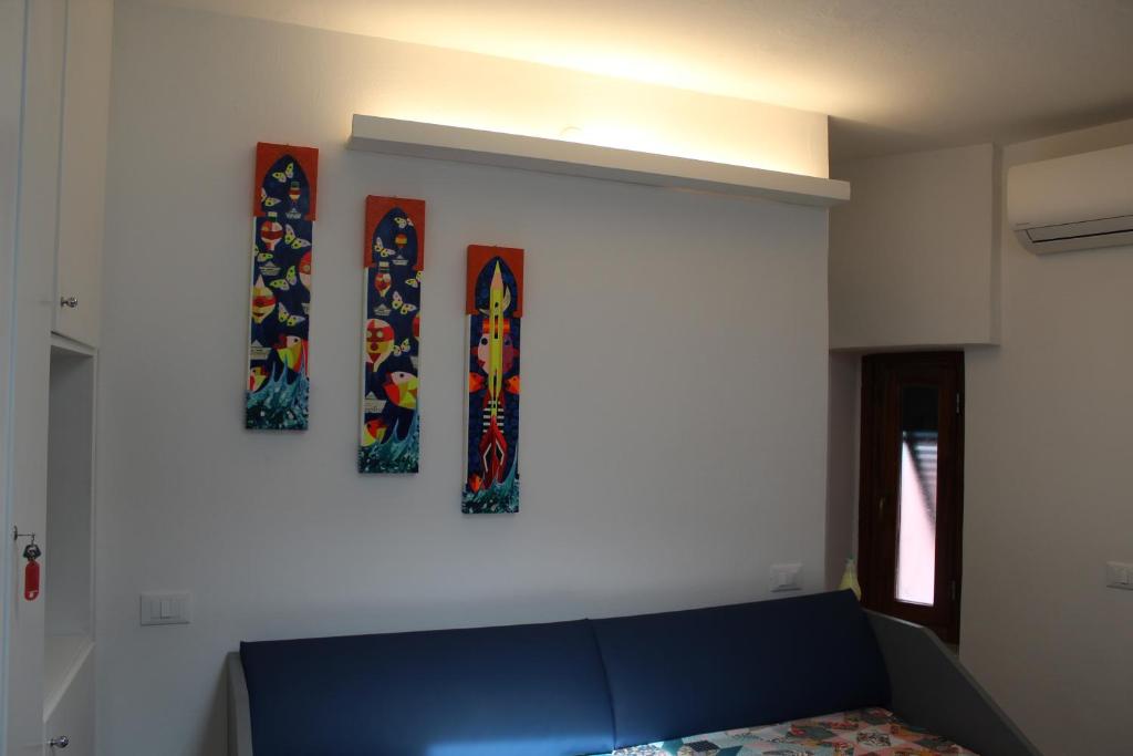 Postel nebo postele na pokoji v ubytování Rina Rooms