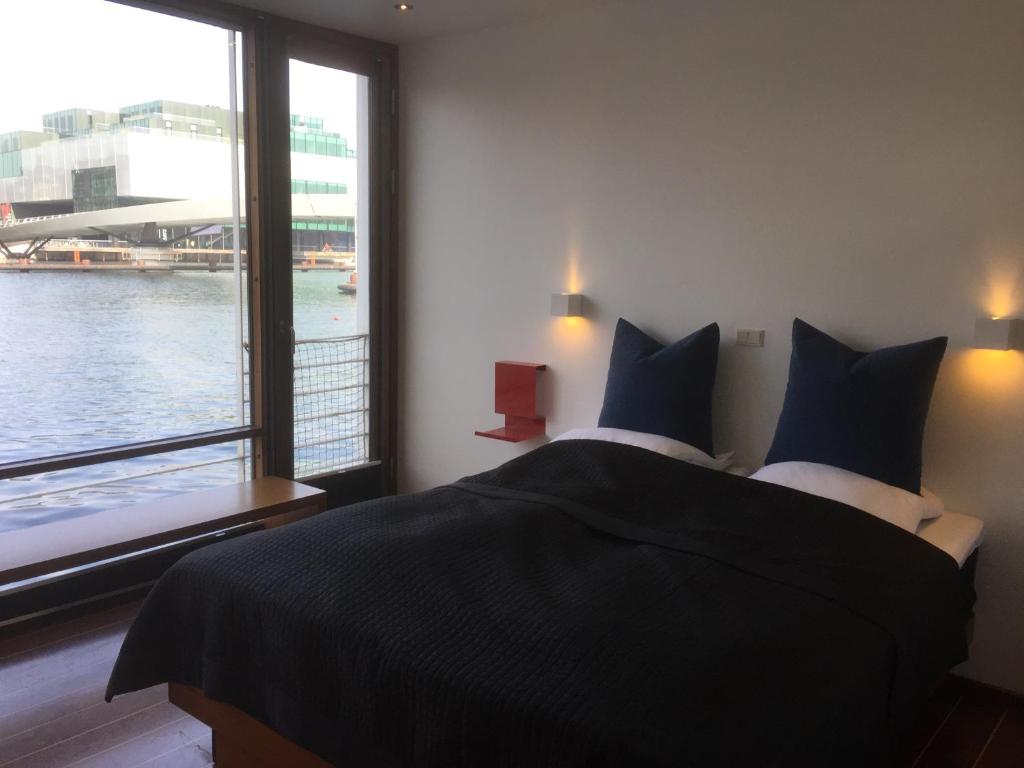 Postel nebo postele na pokoji v ubytování Hotel CPH Living